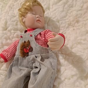 Ashton Drake porcelain doll. 10 inches